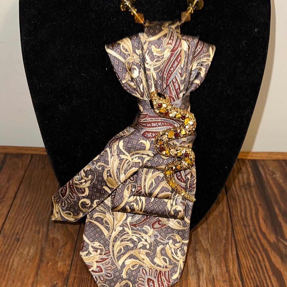 Paisley Silk Tie with Gold rhinestone snake on beaded necklace.
